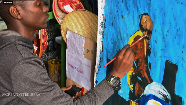 Artist and Youth in Kibera